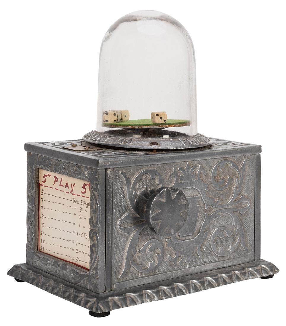 Keystone Novelty Dice Popper Trade Stimulator. (2,000): Keystone Novelty Dice Popper Trade Stimulator. Philadelphia, ca. 1924. Insert a nickel and turn the knob to shake the dice platform. The sum of the five dice determines the number of packages of cigar