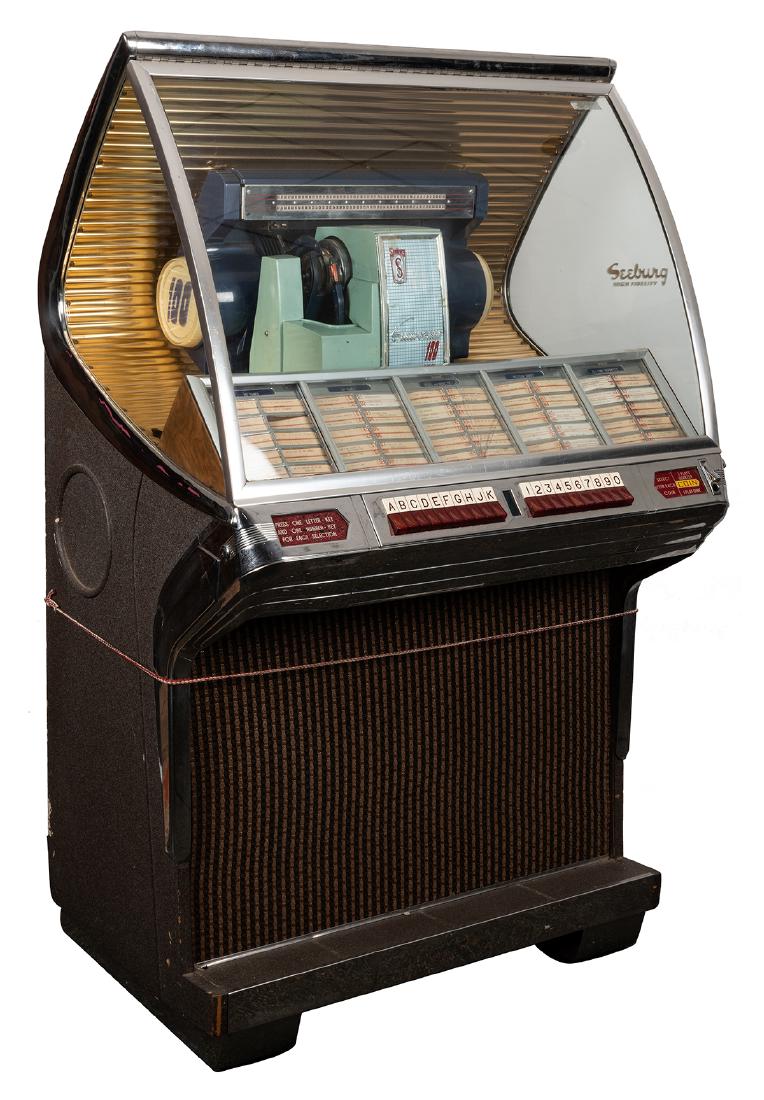 Seeburg 1954 Model HF100R Jukebox (10/25 Cent).: Seeburg 1954 Model HF100R Jukebox (10/25 Cent). Chicago, 1954. One hundred 45 RPM record selections. No lock or key. Two lower back panels missing.
