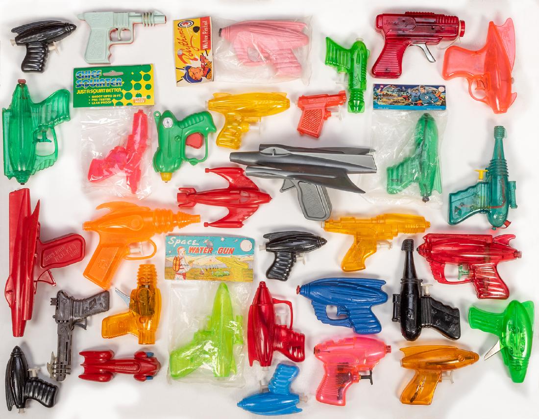 Collection of Over 60 Space and Ray Gun Toys.: Collection of Over 60 Space and Ray Gun Toys. Hong Kong, Japan, China, and U.S.A., various dates. Mainly water pistols, manufacturers include Palmer, Renewal, Arliss, Barton, and others, plastic and p