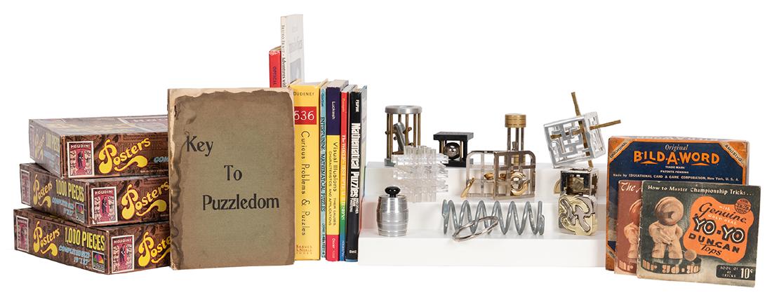 Group of Metal Puzzles and Related Books. (1 of 1)