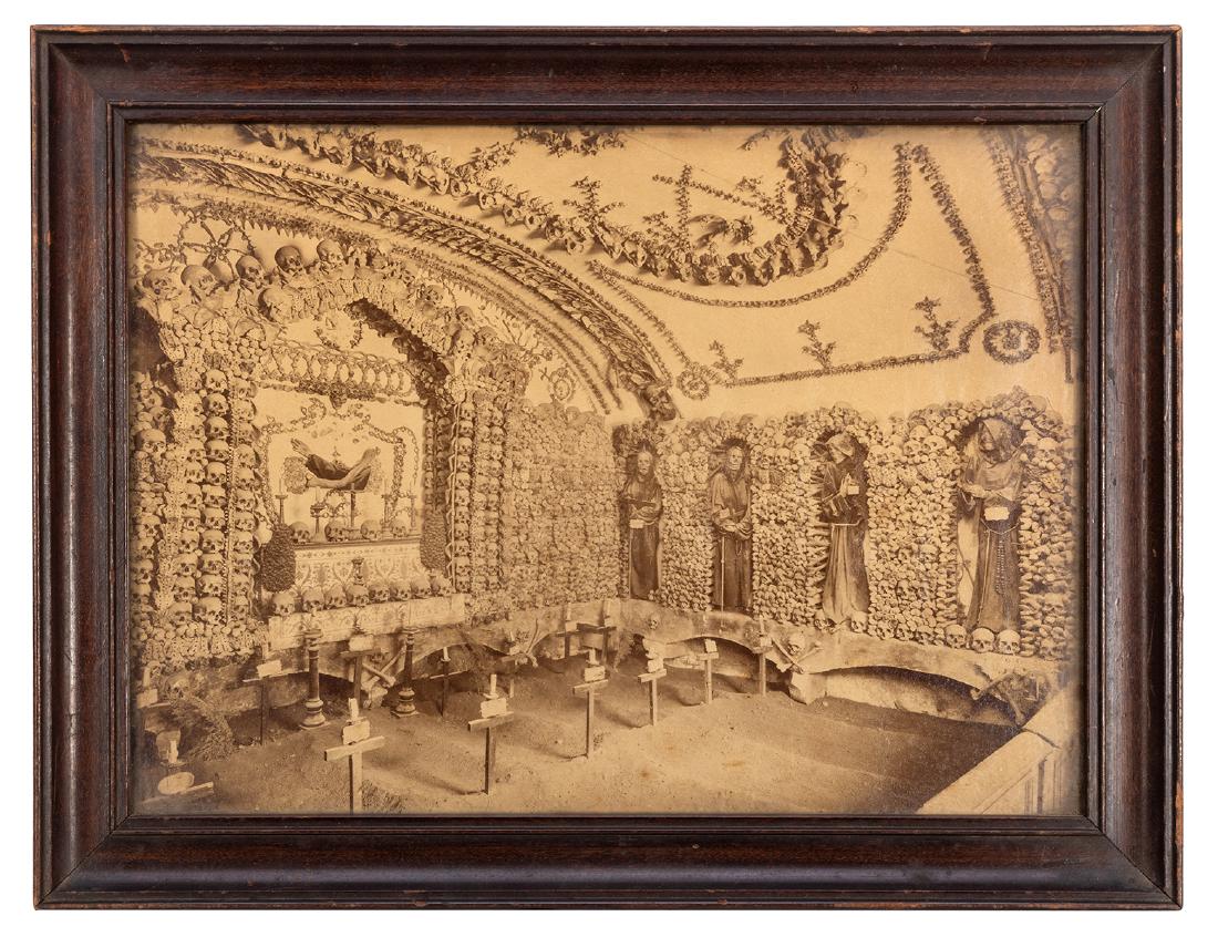 Skull and Human Bones Chapel Photo.: Skull and Human Bones Chapel Photo. Italy, ca. 1890s. Sepia tone photograph of Roman chapel decorated with skulls and bones, and with skeletons dressed in Capuchin robes. Framed to an overall size of