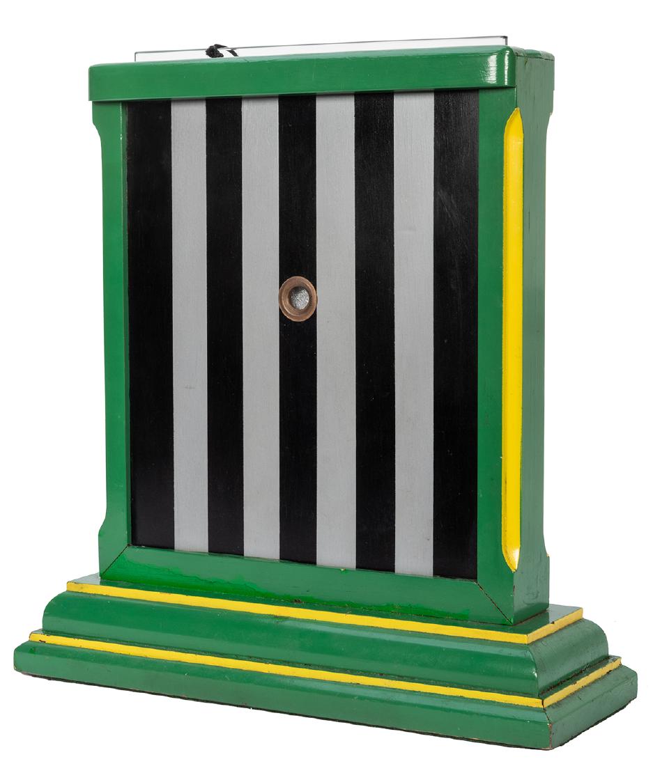 Enchanted Arabian Mirror.: Enchanted Arabian Mirror. Cincinnati: John Snyder, ca. 1939. A sheet of glass with a hole in its center is tied with ribbon into a wooden frame representing a jail cell. The glass penetrates the ribbo
