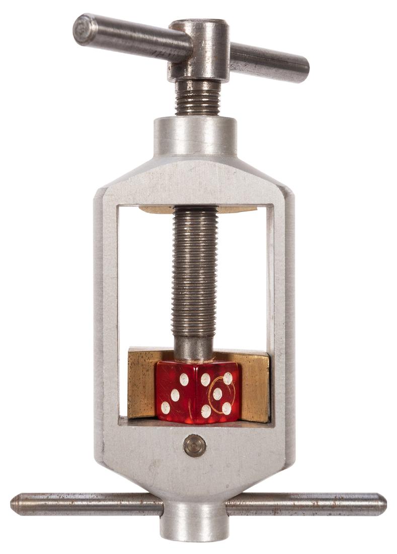 Dice Canceller.: Dice Canceller. Chicago: Mercury Product Co., ca. 1950s. Metal device that defaces and cancels the stamping or logo on dice. 4” long. Very good.