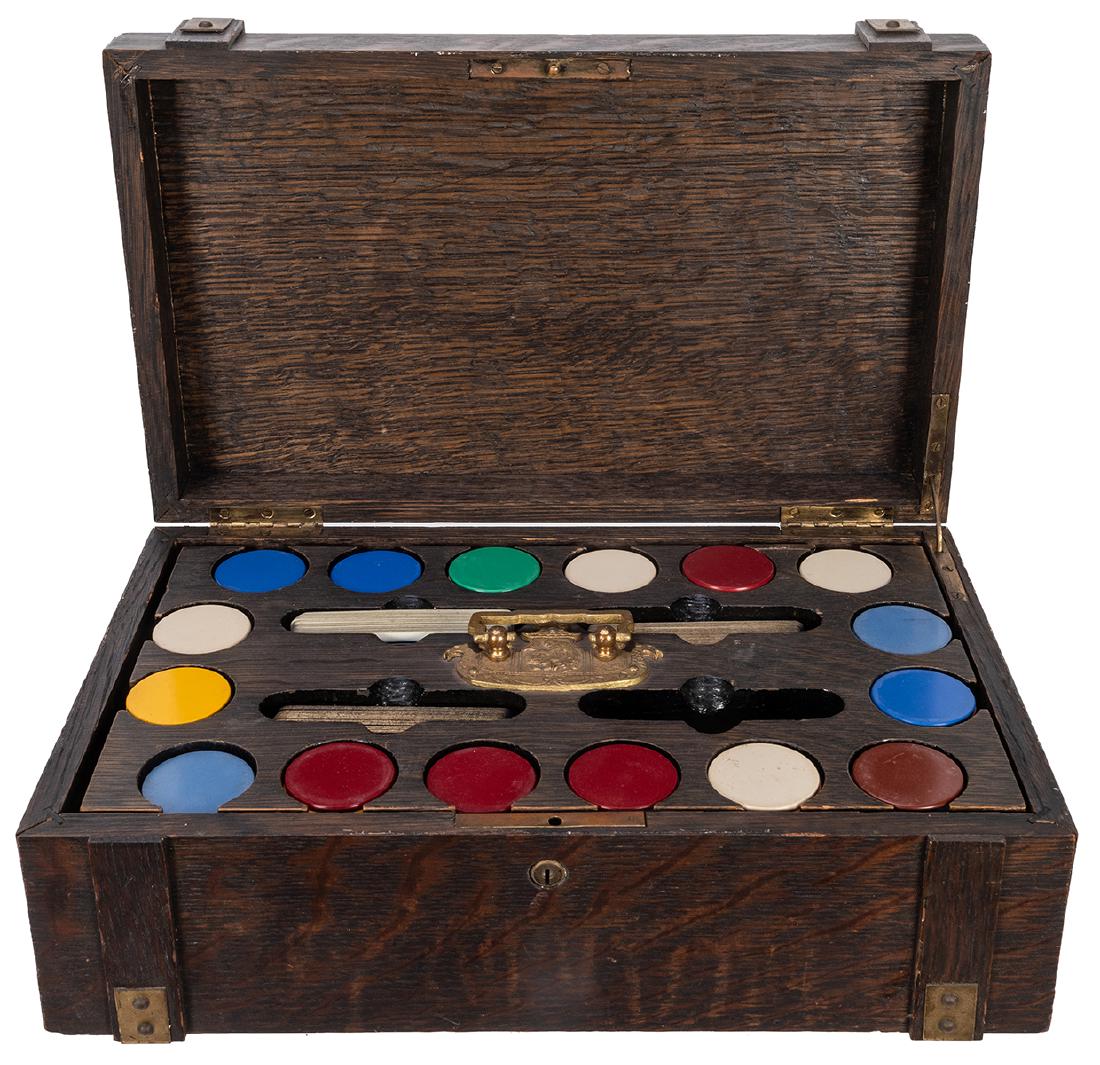 Cased Set of Poker Chips with Rack.: Cased Set of Poker Chips with Rack. American, ca. 1910s. Mission oak-style box with heavy and soil wooden rack of approximately 300 clay chips in multiple colors, inserts for four decks of cards. Bras