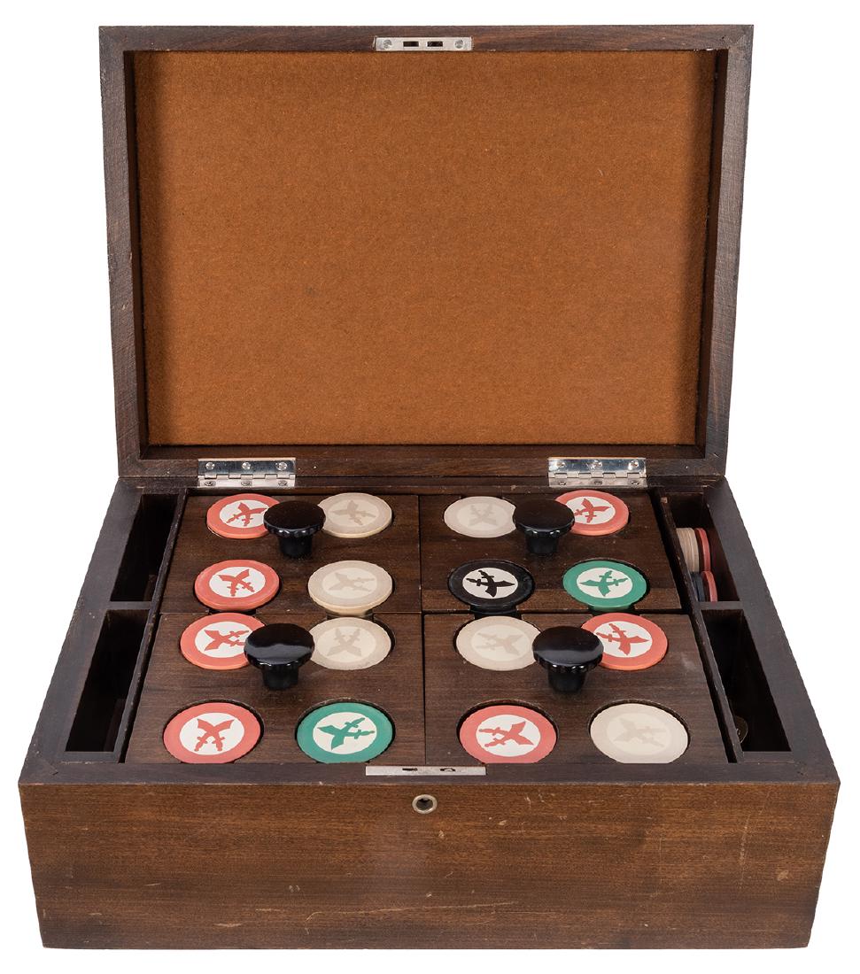 Cased Set of 400 Scimitar Poker Chips.: Cased Set of 400 Scimitar Poker Chips. 1930s. Including red, white, green, and black chips inlaid with scimitar swords housed in a dark walnut case. Also includes 4 separate racks as well as a lock an