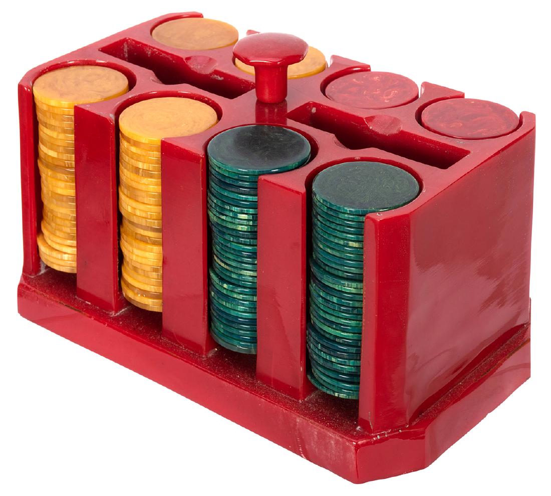 Bakelite Poker Chip Holder and Chips.: Bakelite Poker Chip Holder and Chips. Circa 1930s. Red Bakelite chip caddy with 240 Bakelite chips in red, yellow, and green. Features two slots for holding cards. 7 _ x 5 x 5Â”. Some scrapes, else