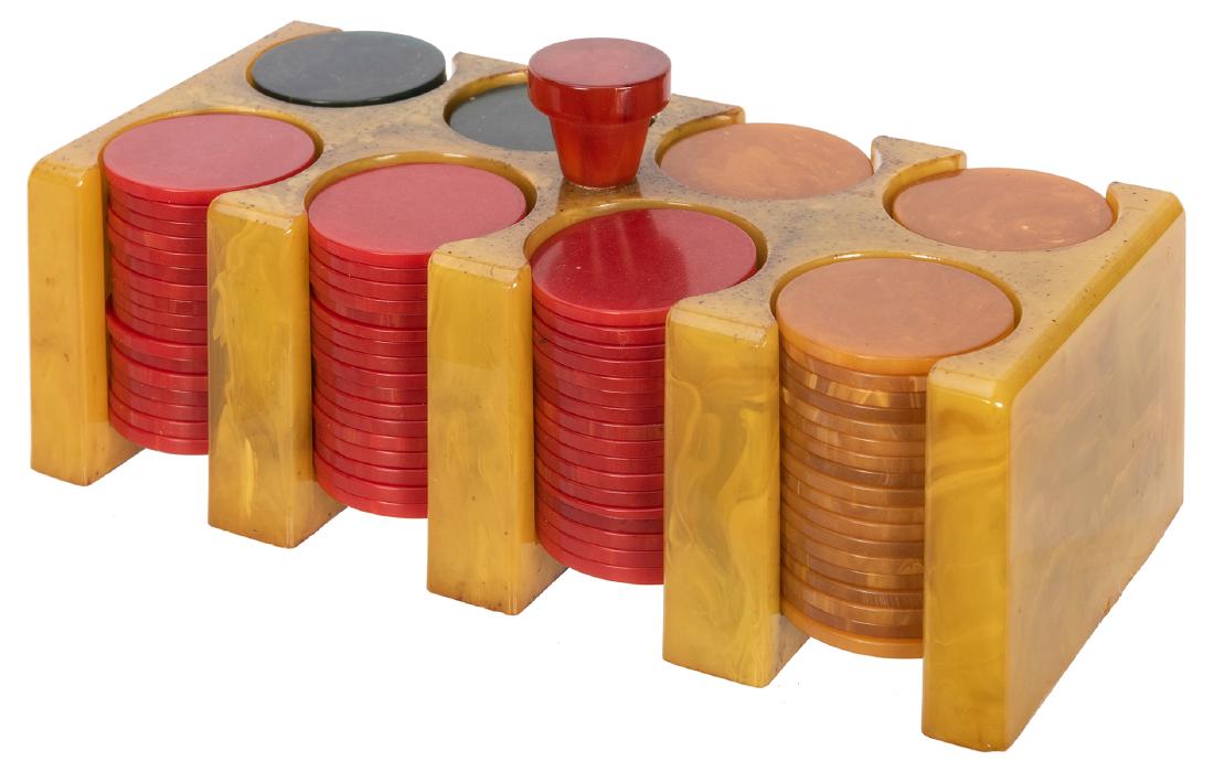 Bakelite Poker Chip Caddy.: Bakelite Poker Chip Caddy. Swirled butterscotch caddy with red handle, full of red, yellow, and green chips. 5 _ x 2 _ x 2”.