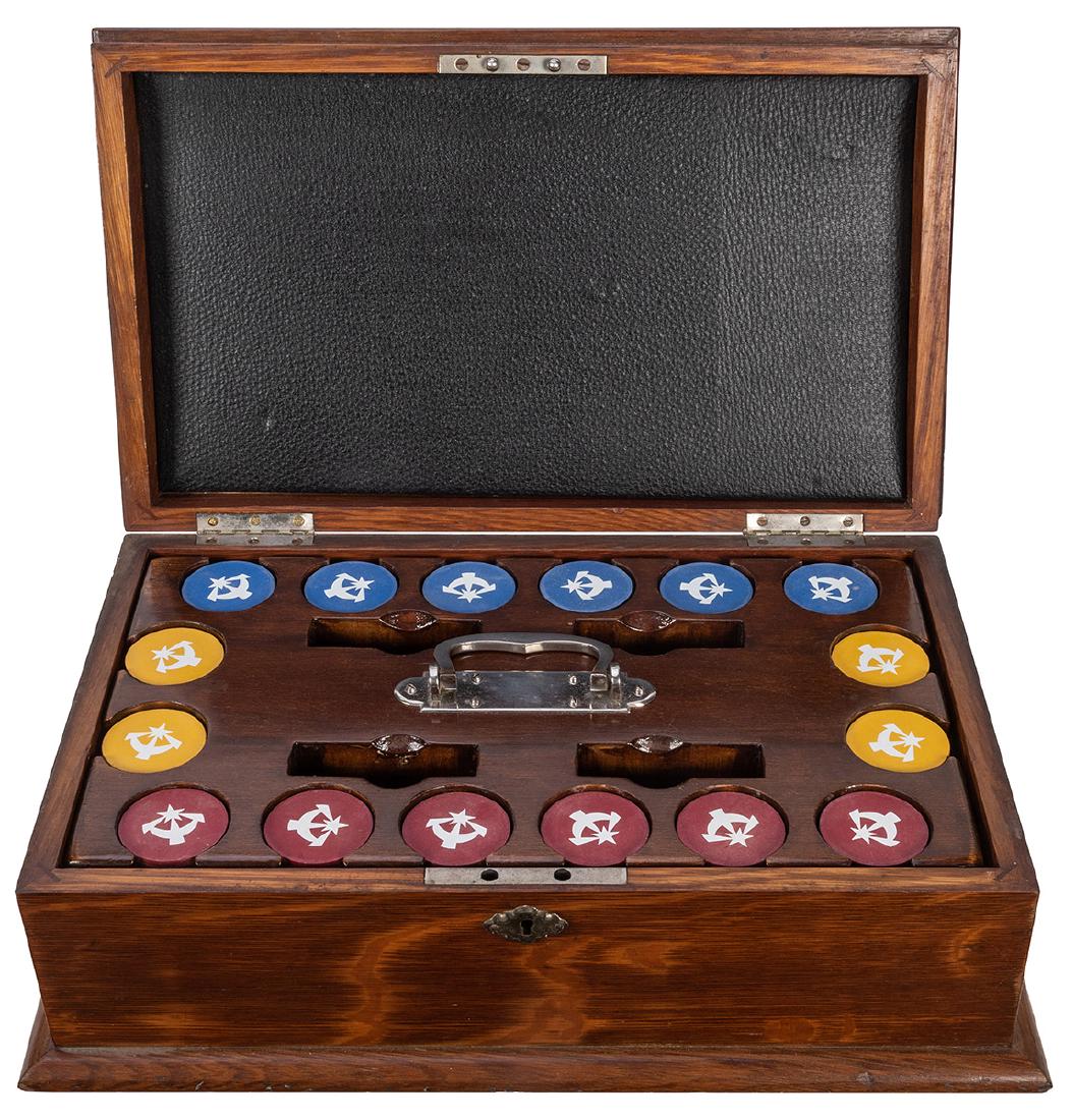 Cased Set of Clay "Arabian" Poker Chips.: Cased Set of Clay Â“ArabianÂ” Poker Chips. Handsome antique inlaid oak case with a caddy of blue, maroon, and yellow star and crescent design poker chips. Overall 14 _ x 9 _ x 5Â”. Lock and k