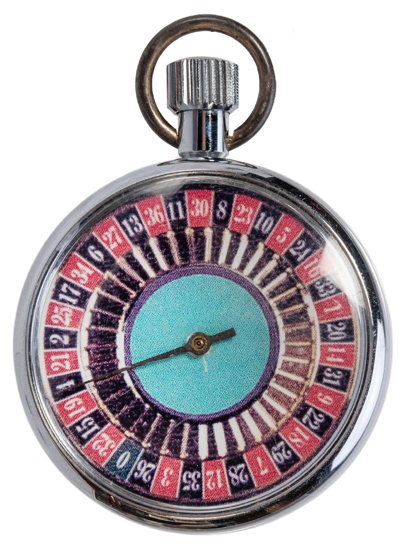 Roulette Pocket Watch.: Roulette Pocket Watch. 1980s. Steel case with photographic dial. Press down on the stem to make the dial spin. Working, otherwise very good.