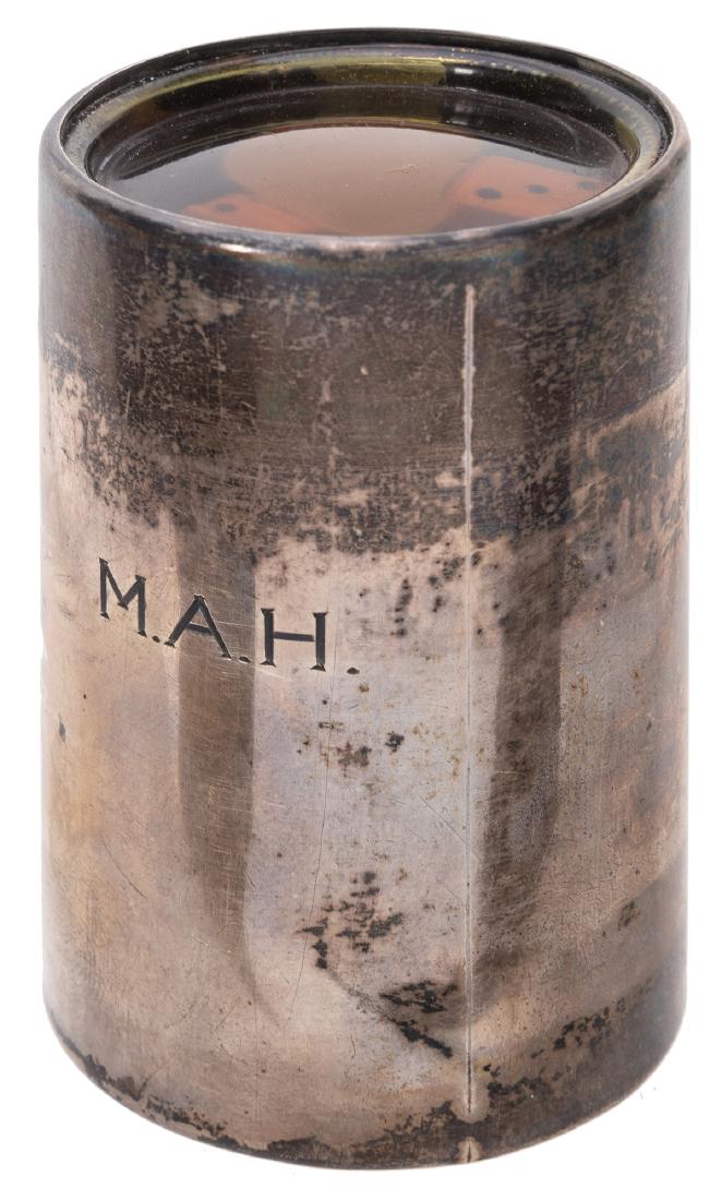 Custom Made Dice Shaker.: Custom Made Dice Shaker. New York: Udall & Ballou, ca. 1920s. Sterling silver dice shaker engraved with initials M.A.H. The shaker is filled with liquid, when turned over, the dice will float to the t