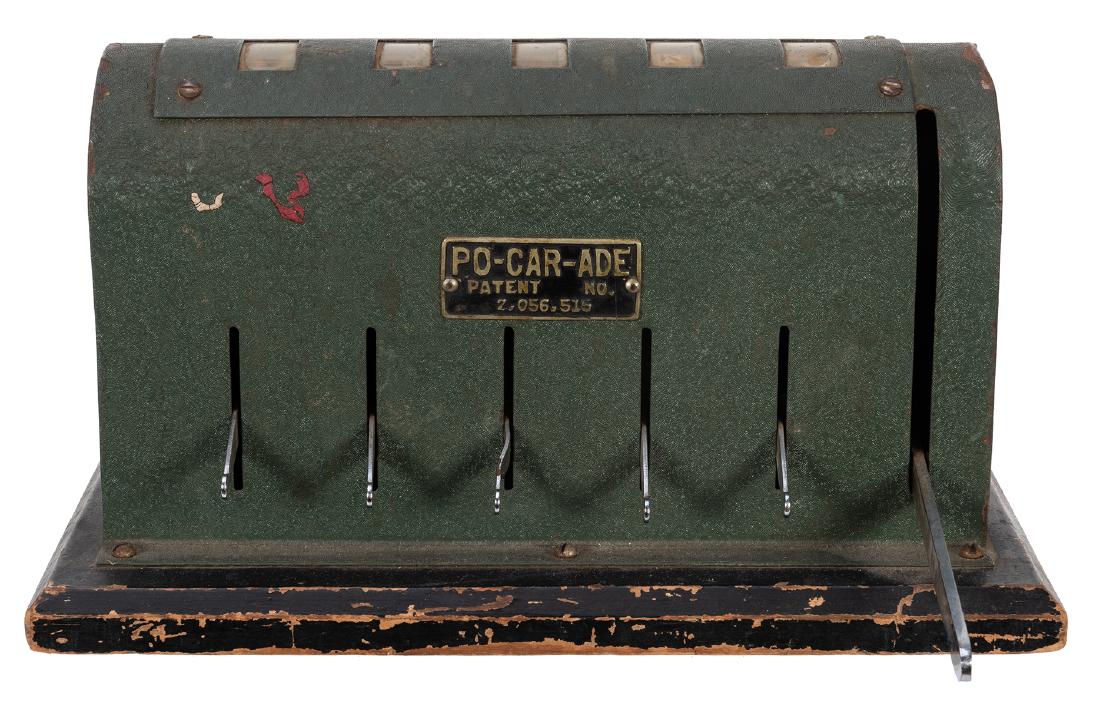 Countertop “Po-Car-Ade” Five Reel Poker Hand.: Countertop “Po-Car-Ade” Five Reel Poker Hand. Theodore Glaser, 1936. Sheet metal game on wooden base. Some suits worn off reels, wooden base heavily chipped, paint on metal chipped. 10 _ x 5 _ x 5