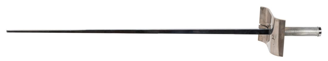 Card Sword.: Card Sword. London: Harry Stanley, ca. 1955. A selected card is speared at the end of the sword when a full pack of cards is thrown into the air. Length 33 ½”.