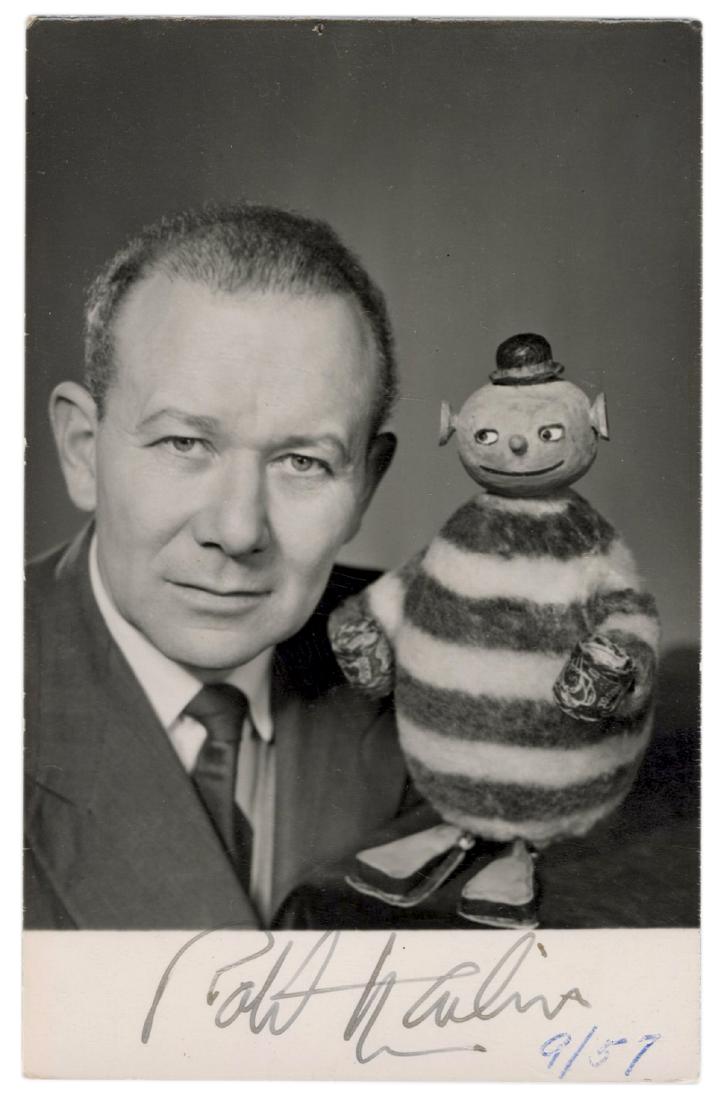 Robert Harbin Origami Dog and Signed Postcard.: Harbin, Robert. Robert Harbin Origami Dog and Signed Postcard. Two pieces, comprising a real photo postcard of Harbin, signed in the margin and dated in a second hand ″(9/57″), and a folde