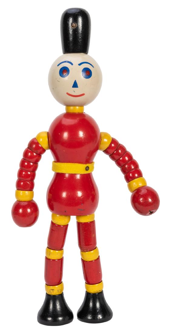 Tedtoys Giant Wooden Soldier Positionable Figure.: Giant Wooden Soldier Positionable Figure. 1927. Ted Toy-lers, U.S., 16” tall; huge, brightly painted wood joined figure with felt belt; internal elastic enables it to assume multiple positions; has 