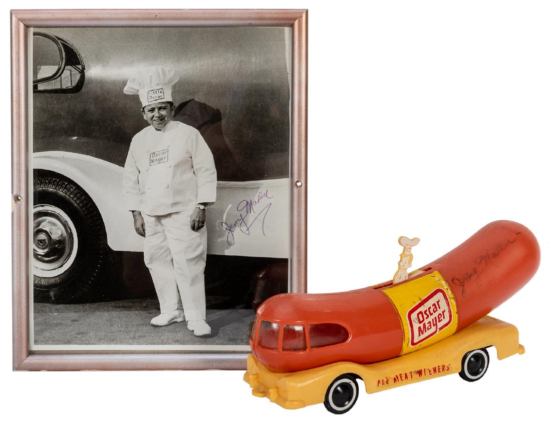 A Photo and Oscar Mayer Weinermobile Signed by “ (1 of 3)