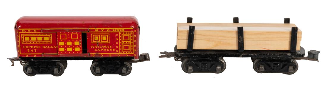 Marx Freight Train Cars Lot. 1940s. Lithographed tin on: Marx Freight Train Cars Lot. 1940s. Lithographed tin on black frames with one-way couplers; includes two pieces: #547 New York Central Railway Express Baggage red boxcar with opening doors; #563 U-sta