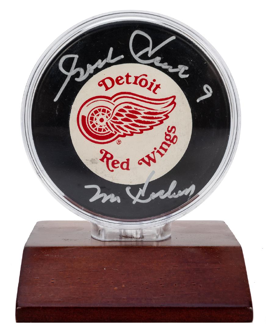 Gordie Howe Signed Hockey Puck. An official NHL rubber (1 of 2)