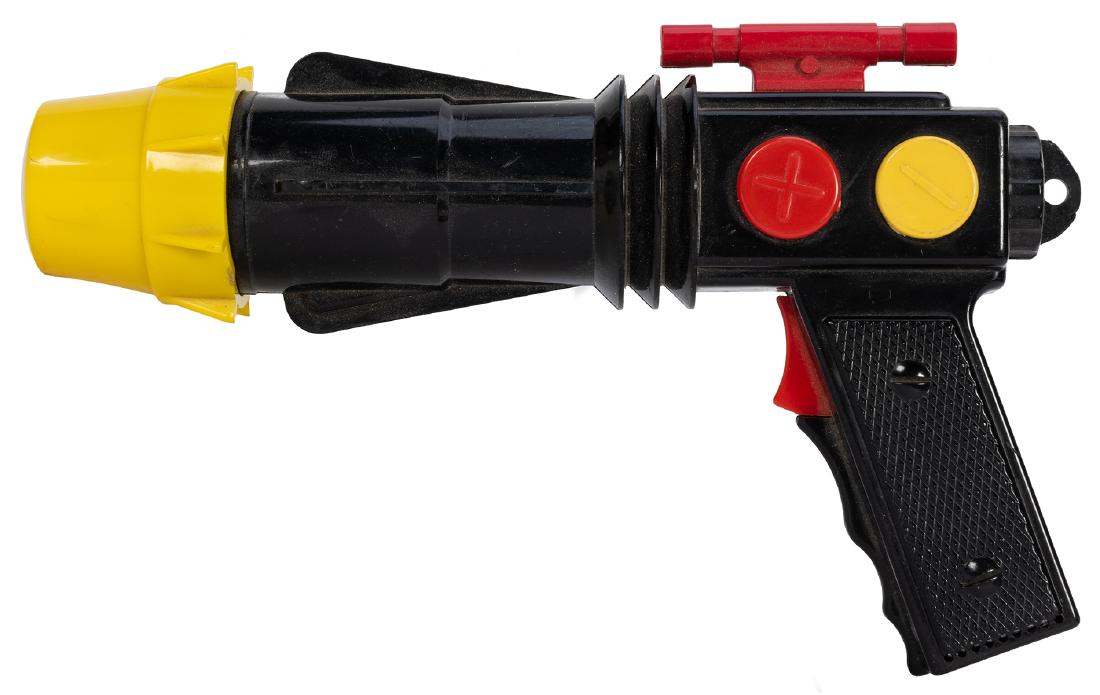 Buck Rogers Sonic Ray Gun. Chicago: Norton Engineering: Buck Rogers Sonic Ray Gun. Chicago: Norton Engineering & Mfg. Co., ca. 1955. Black, red, and yellow plastic version of this toy, it becomes a flashlight when trigger is pulled. Includes original light