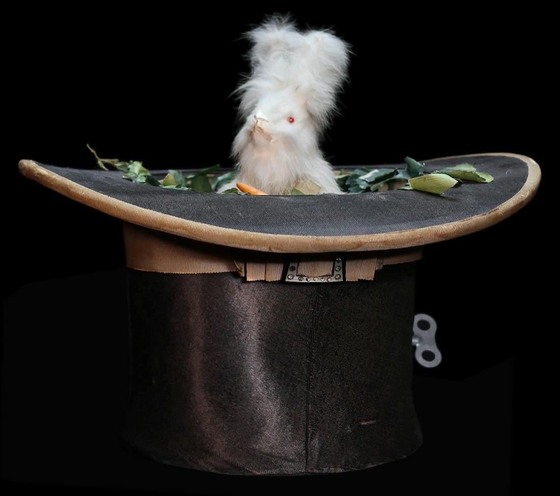 Rabbit in Hat Automaton.: Rabbit in Hat Automaton. Paris: Roullet & Decamps, ca. 1910. A snow white rabbit rises from the center of the silk opera hat when the mechanism is triggered. Real fur, glass eyes, and paper leaves cov