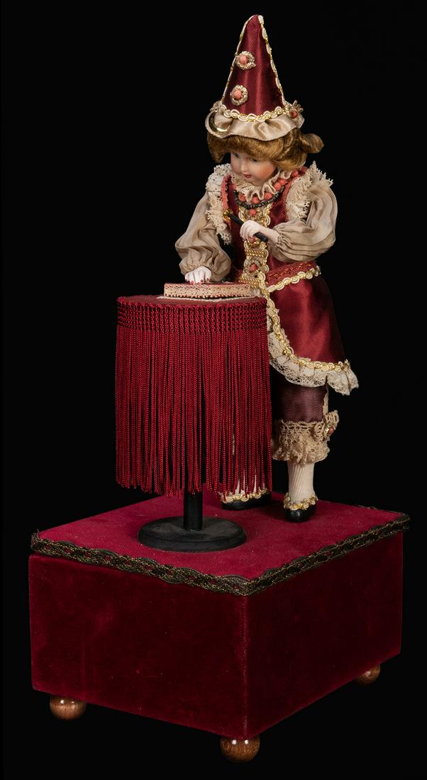 Musical Conjurer Automaton.: Musical Conjurer Automaton. Spain: Zdenka, contemporary. Single air cylinder musical movement causes the miniature magician to wave a wand and lift the box with the other hand. The cards on the table