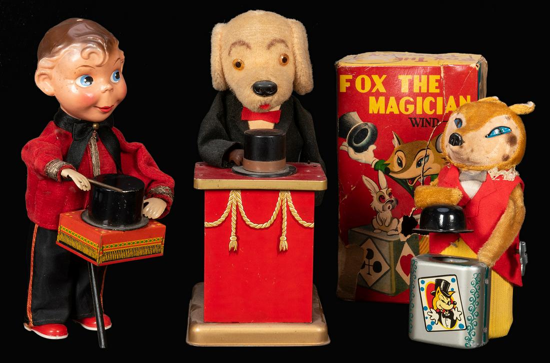 Trio of Magician Wind-Up Toys.: Trio of Magician Wind-Up Toys. Lithographed tin, plastic, and fabric toys, including Fox the Magician (not working; with original box, rips and losses to lid); Triksie Magician Dog (working; changes e