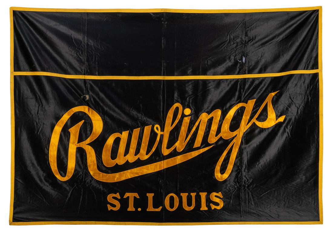 Rawlings Advertisement Banner.: Rawlings Advertisement Banner. St. Louis. A black and yellow silk banner with gold trim featuring the name of the famous sporting equipment brand. 49 x 68”. Fraying at fold marks; one open tear 