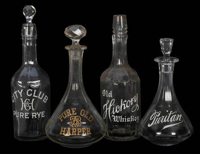 Lot of Four Whiskey / Rye Back Bar Bottles.: Lot of Four Whiskey / Rye Back Bar Bottles. Colorless glass decanters and bottles, three with stoppers, raised enameled lettering. Includes Pure Old Harper, Puritan, Old Hickory Whiskey, and City Club