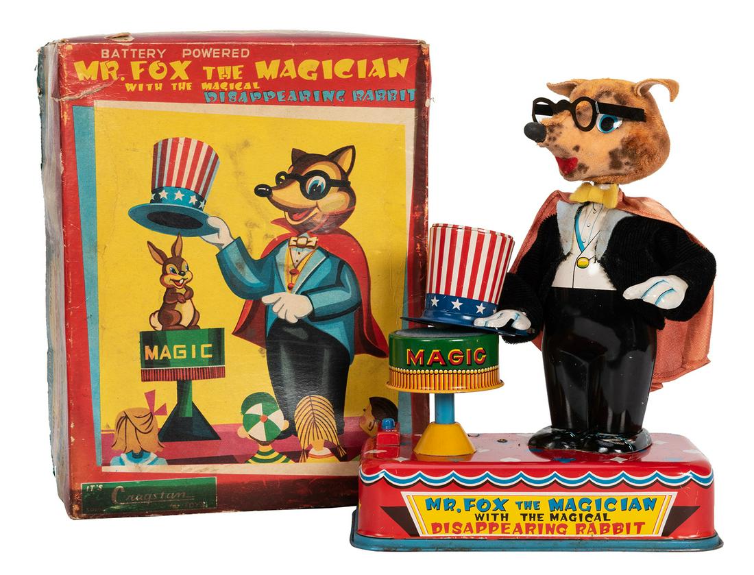 Cragstan Fox the Magician Battery-Operated Toy in: Cragstan Fox the Magician Battery-Operated Toy in Original Box. 1950s. Lithographed tin stand, hat, and base, magician with tin body, fabric tuxedo and cape, wire glasses. When activated, magician pro
