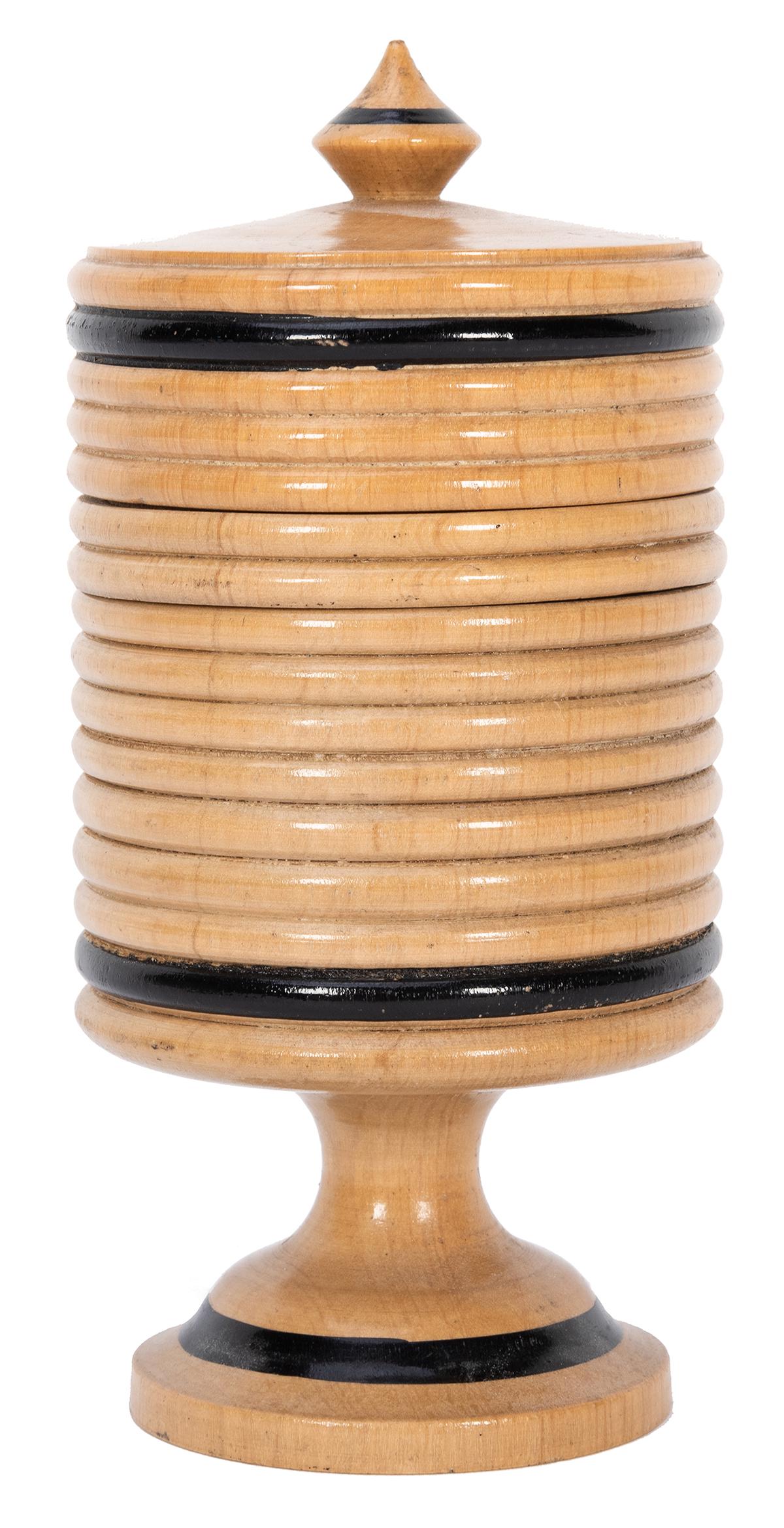 Giant Transformation Vase.: Giant Transformation Vase. Circa 1920. Hardwood vase changes, vanishes, or produces stamps, millet, or large coins placed inside. Height 5 3/8, diameter 2 3/8”. The largest example we have encounter