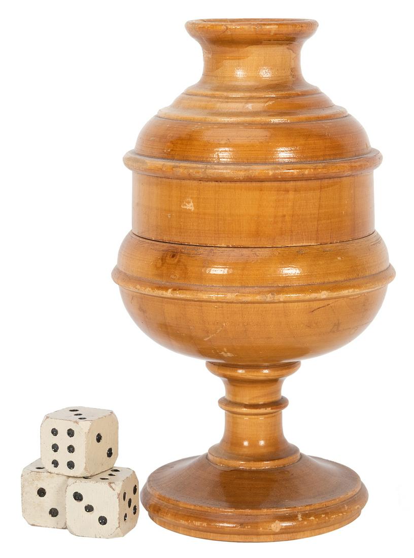 Dice Vase.: Dice Vase. Circa 1910. Turned wooden vase allows the performer to control the roll of dice thrown inside, or predict the numbers uppermost on the dice. Height 5 5/8”. A large example. Finish scratch