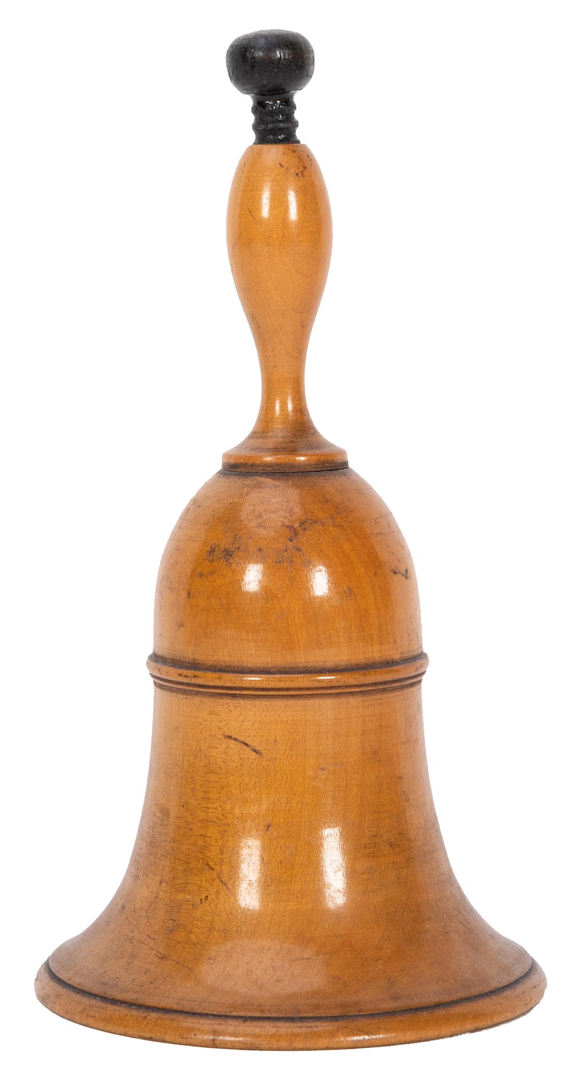 Millet Bell.: Millet Bell. Circa 1900. Turned wooden bell produces a quantity of dry millet or rice underneath it, on command. Finely turned and finished. Height 6 ½”.