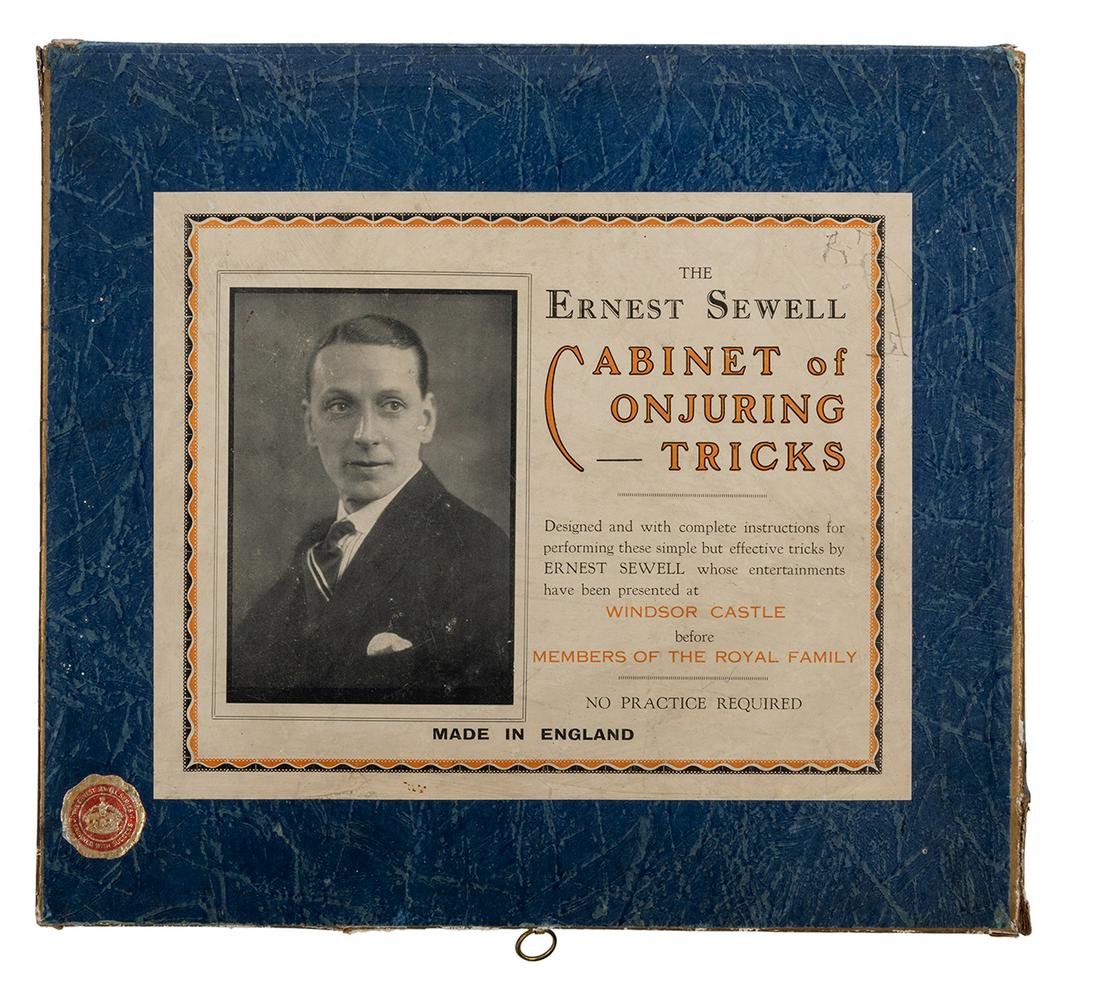 Ernest Sewell Cabinet of Conjuring Tricks. No. 3 Size.: Ernest Sewell Cabinet of Conjuring Tricks. No. 3 Size. Circa 1940. Vintage magic set includes metal, wooden, and paper props, including a coin vanishing cup, Vanishing Candle, Linking Rings, Vanishing