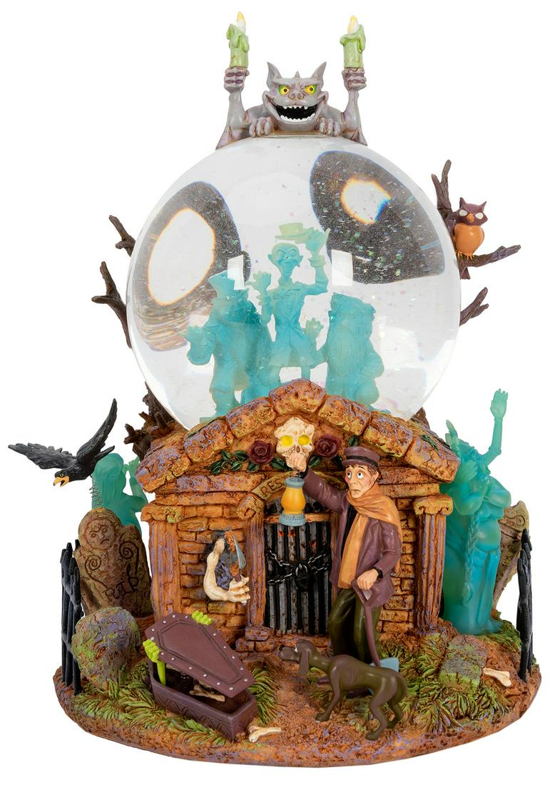 Haunted Mansion Snow Globe. Fantastic snow globe: Haunted Mansion Snow Globe. Fantastic snow globe with a bunch of little things on it. Sold through the Disney catalogue, in original packing and box. 9” tall.