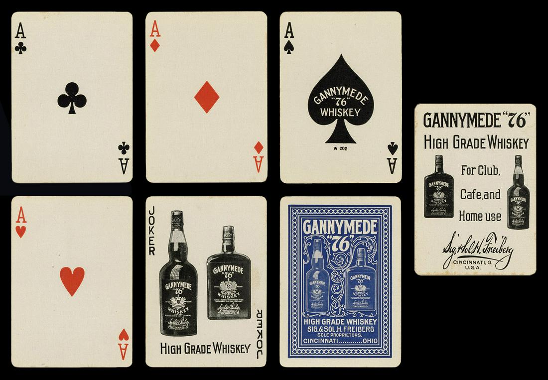 [Alcohol] Gannymede “76” Whiskey Advertising Playing: [Alcohol] Gannymede “76” Whiskey Advertising Playing Cards. Cincinnati, ca. 1900s. 52 + J + EX + OB. Joker and extra card advertise the whiskey of Sig. and Sol. H Freiberg, showing the product in 