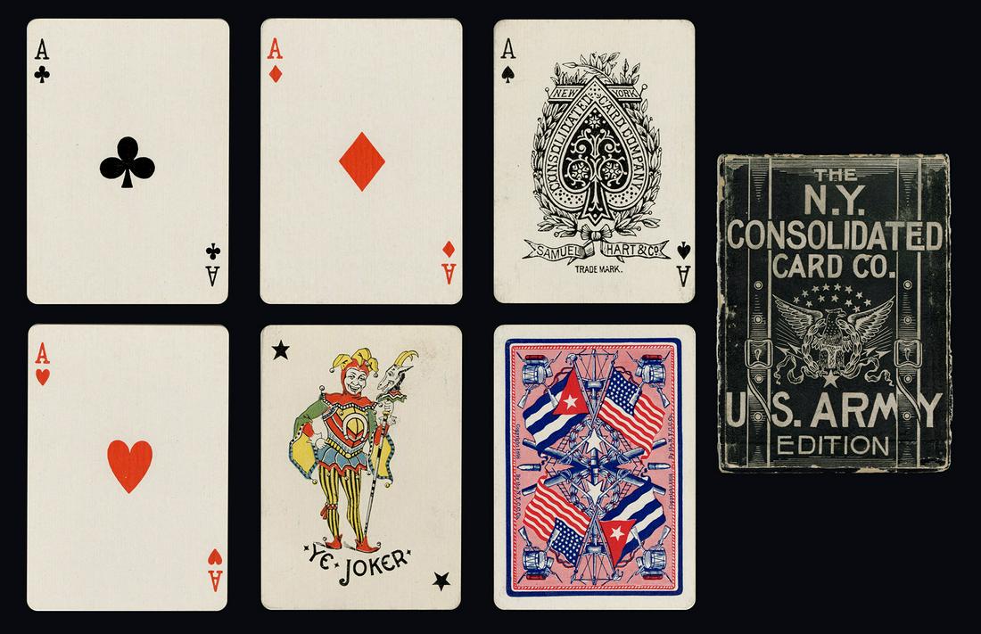 NYCC U.S. Army “Spanish American War” Playing Cards.: NYCC U.S. Army “Spanish American War” Playing Cards. NYCC, ca. 1898. 52 + J + OB. Retains a panel from the larger outer box which is designed to resemble a knapsack. Originally, the box would have