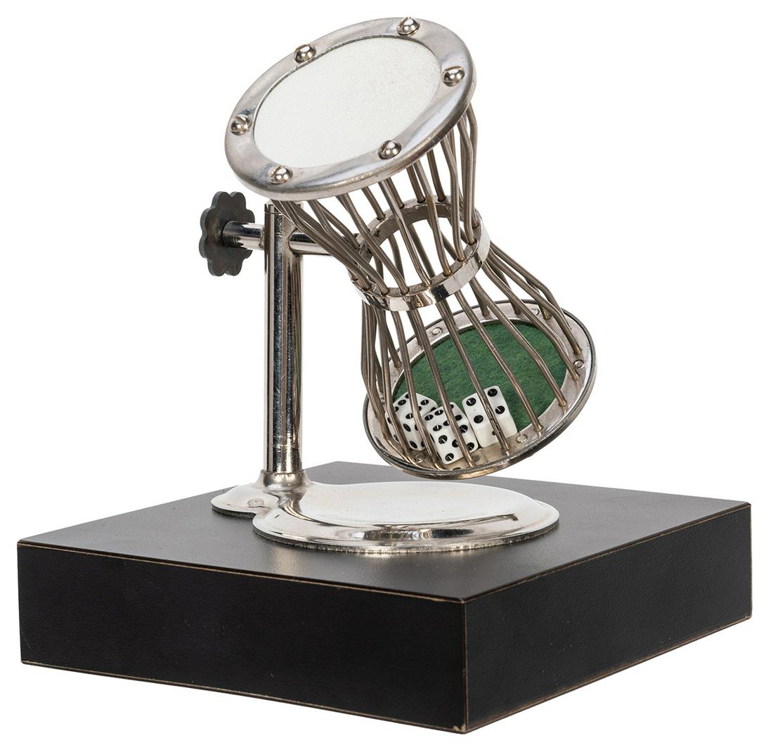 Gaffed Chuck-A-Luck cage.: Gaffed Chuck-A-Luck cage. Circa 1990. Miniature cage contains three magnetic dice. The cage is mounted to a black, magnetic base. Cage of an uncommon size. Overall height 6”.
