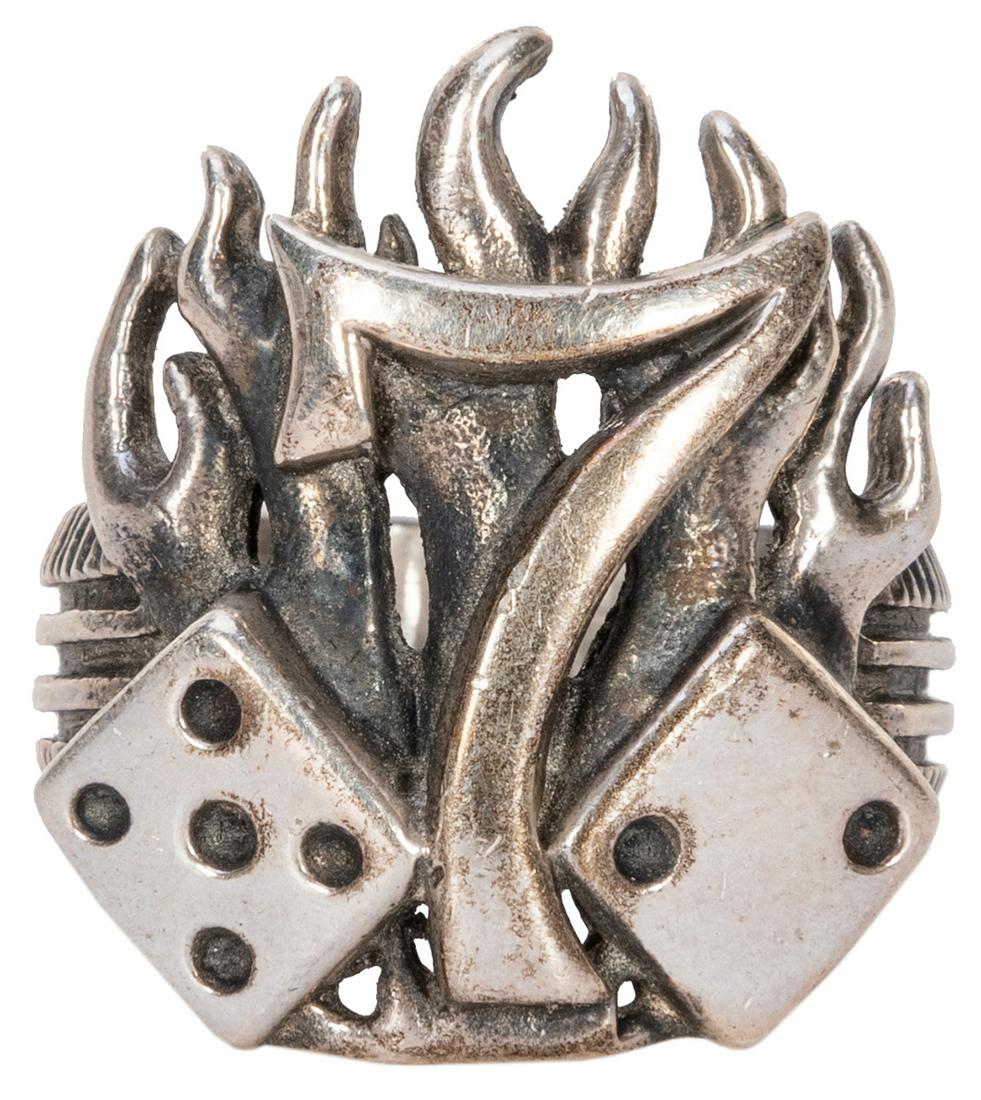Lucky Symbols. Sterling Silver Ring.: Lucky Symbols. Sterling Silver Ring. The number cast into a signet-style ring with flames behind the numeral and flanked by two dice, showing the five and two pips uppermost. Size 11.
