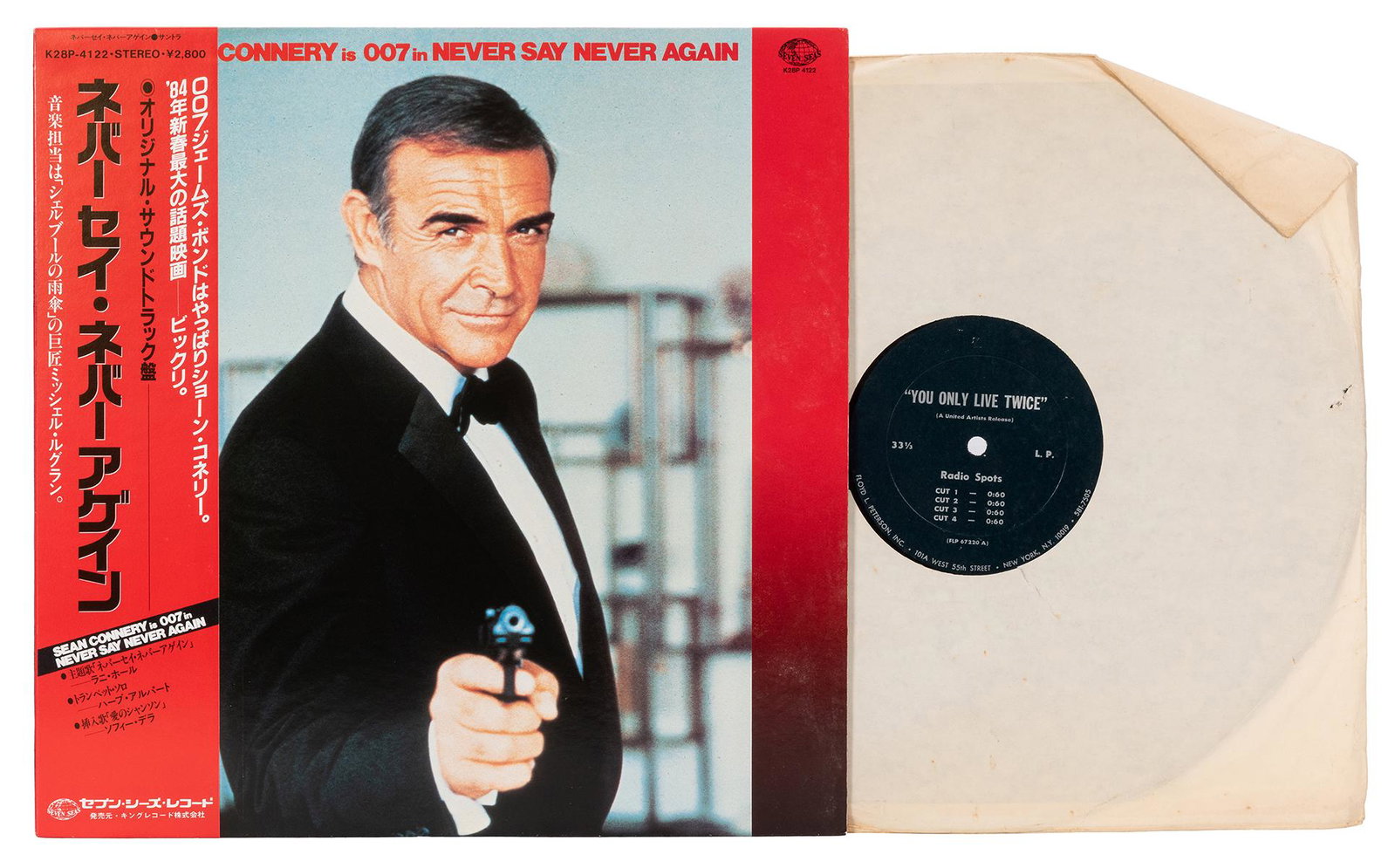 Pair of Early James Bond LPs.: [Music – James Bond] Pair of Early James Bond LPs. Includes the Japanese Pressing of Never Say Never Again (unopened) and radio spots used to promote for You Only Live Twice. Overall good.