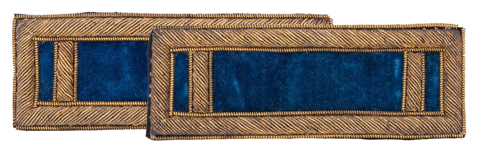 Pair of Civil War Era Infantry Lieutenant’s Shoulder: [Civil War] Pair of Civil War Era Infantry Lieutenant’s Shoulder Straps. Single-border bullion borders and rank device on a blue velvet field. 1 ½ x 4”. Near fine. From The Stephen Sa