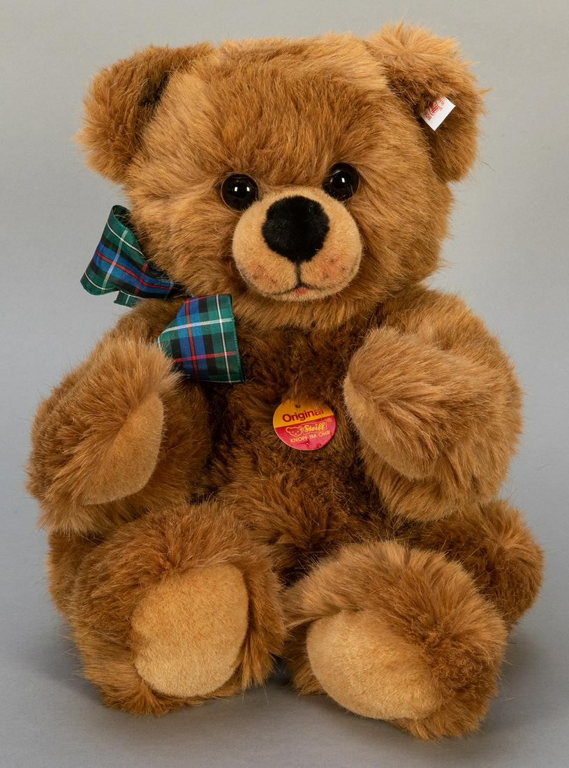 Steiff Unproduced FAO Schwarz Teddy Bear. An unproduced: Steiff Unproduced FAO Schwarz Teddy Bear. An unproduced prototype bear, with long and soft mohair blend coat. Plaid fabric ribbon tie. White “Not for Sale” ear tag. Chest tag. Height 12