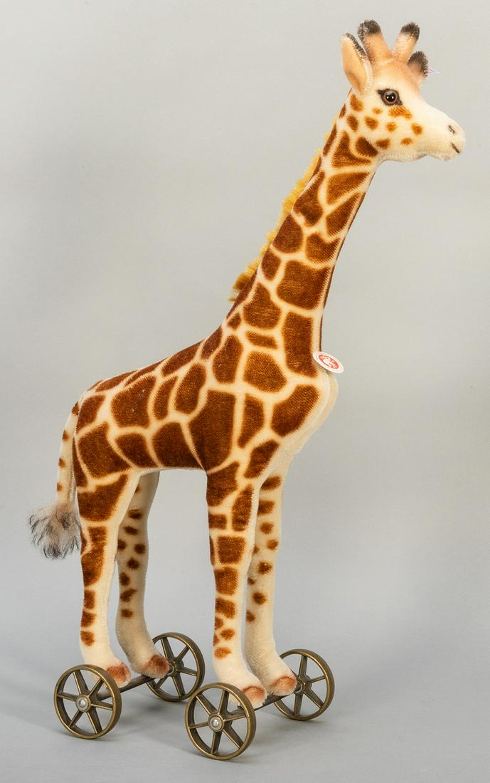 Steiff Giraffe on Wheels. 2009. One of 1,000 examples,: Steiff Giraffe on Wheels. 2009. One of 1,000 examples, this with the low number of 40 from the edition. Height 24 ½”.