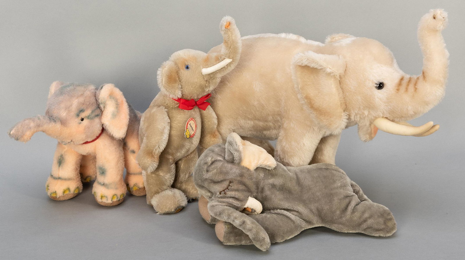 Lot of 4 Steiff Elephants. Including African Elephant: Lot of 4 Steiff Elephants. Including African Elephant Discovery Channel/Animal Planet (EAN 665301; edition of 1,500), length 17”; Jumbo 1932 Replica (EAN 0125/24; edition 4,000), height 14”