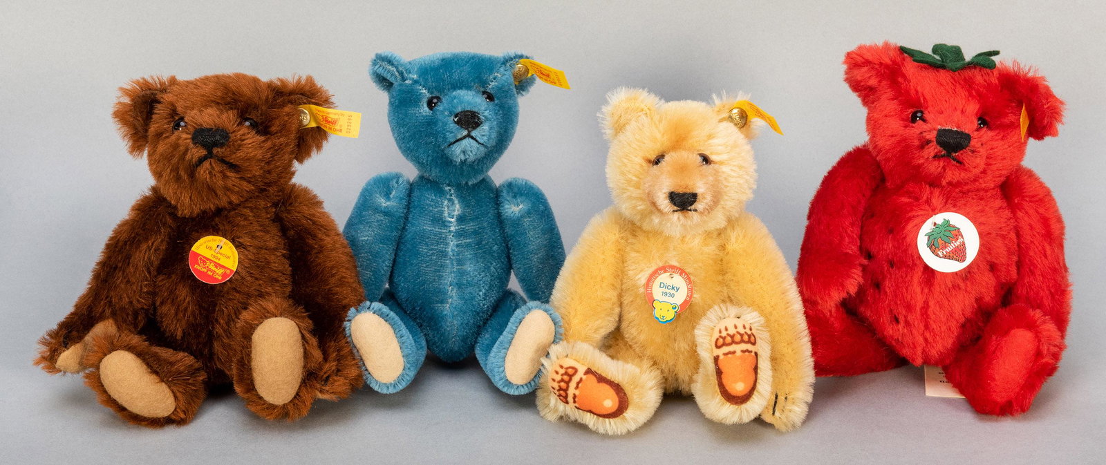 Steiff Small Special Edition / Replica Teddy Bears. Lot: Steiff Small Special Edition / Replica Teddy Bears. Lot of 4. Including Dicky 1930 (029783); North American Brown Bear historic miniature (029295); Fruities Strawberry Teddy Bear (028038); and 1908 Bl