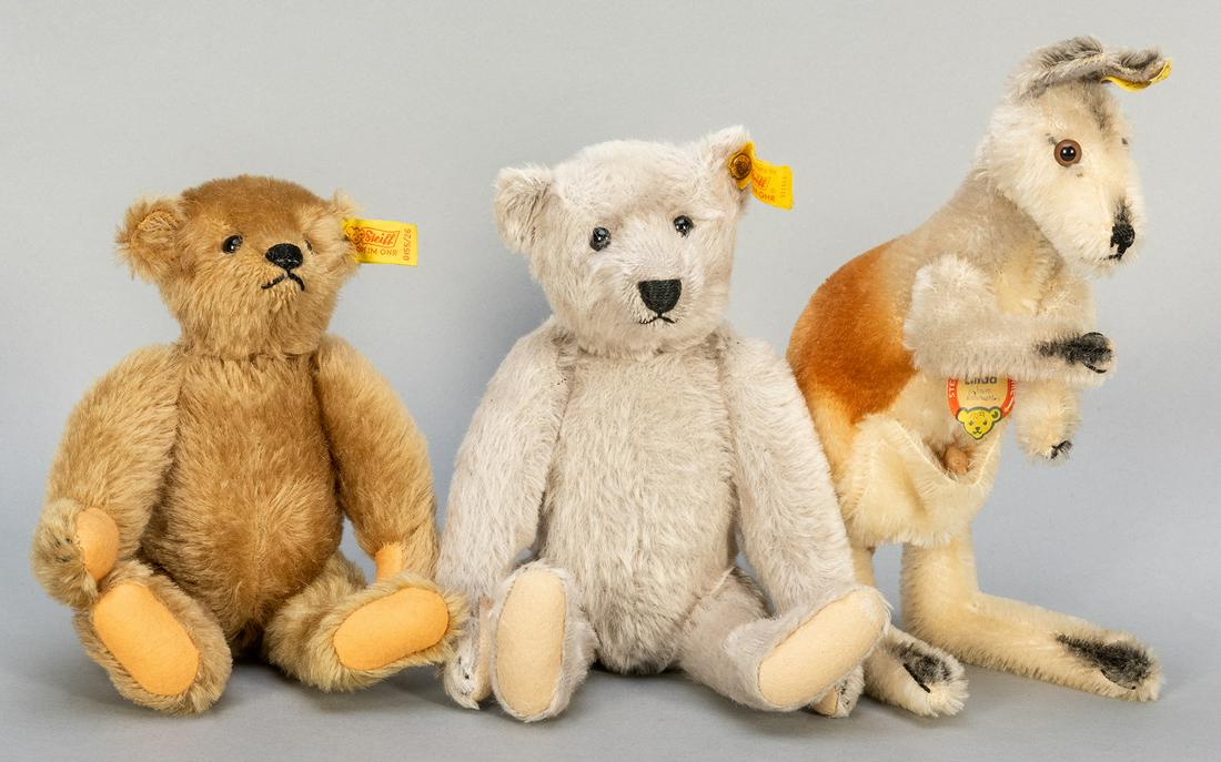 Steiff Teddy Bear and Kangaroo Trio. Including Linda: Steiff Teddy Bear and Kangaroo Trio. Including Linda kangaroo (4328/00), yellow ear tag, with plastic Joey in pouch, 11”; brown mohair Teddy (0155/26), 9”, cotton/wool, Made in W. Germany;