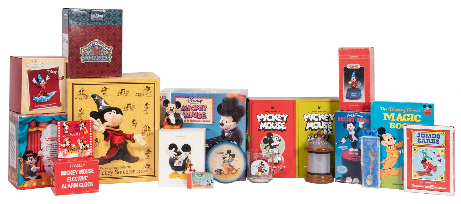 [Disney] Mickey Mouse Fantasia / Magician Collection.: [Disney] Mickey Mouse Fantasia / Magician Collection. Collection of vintage items featuring Mickey Mouse as a magician or wizard (as in “Fantasia”). Including toys, plates, books, Tokyo Di