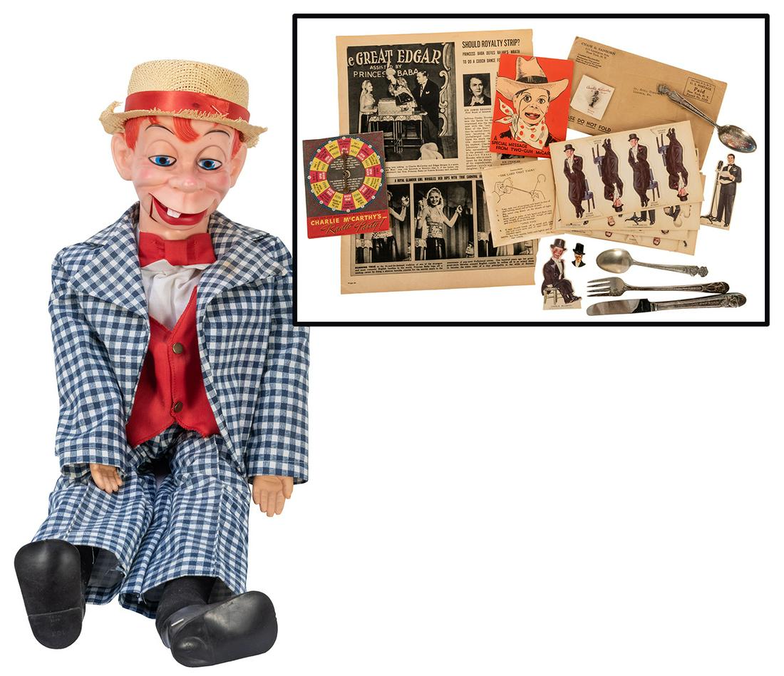 Charlie McCarthy / Edgar Bergen Memorabilia Lot.: Charlie McCarthy / Edgar Bergen Memorabilia Lot. Including a pair of bookends; souvenir spoon, knife, and fork; cardboard puppets of Charlie McCarthy and Mortimer Snerd; movable sterling McCarthy mini