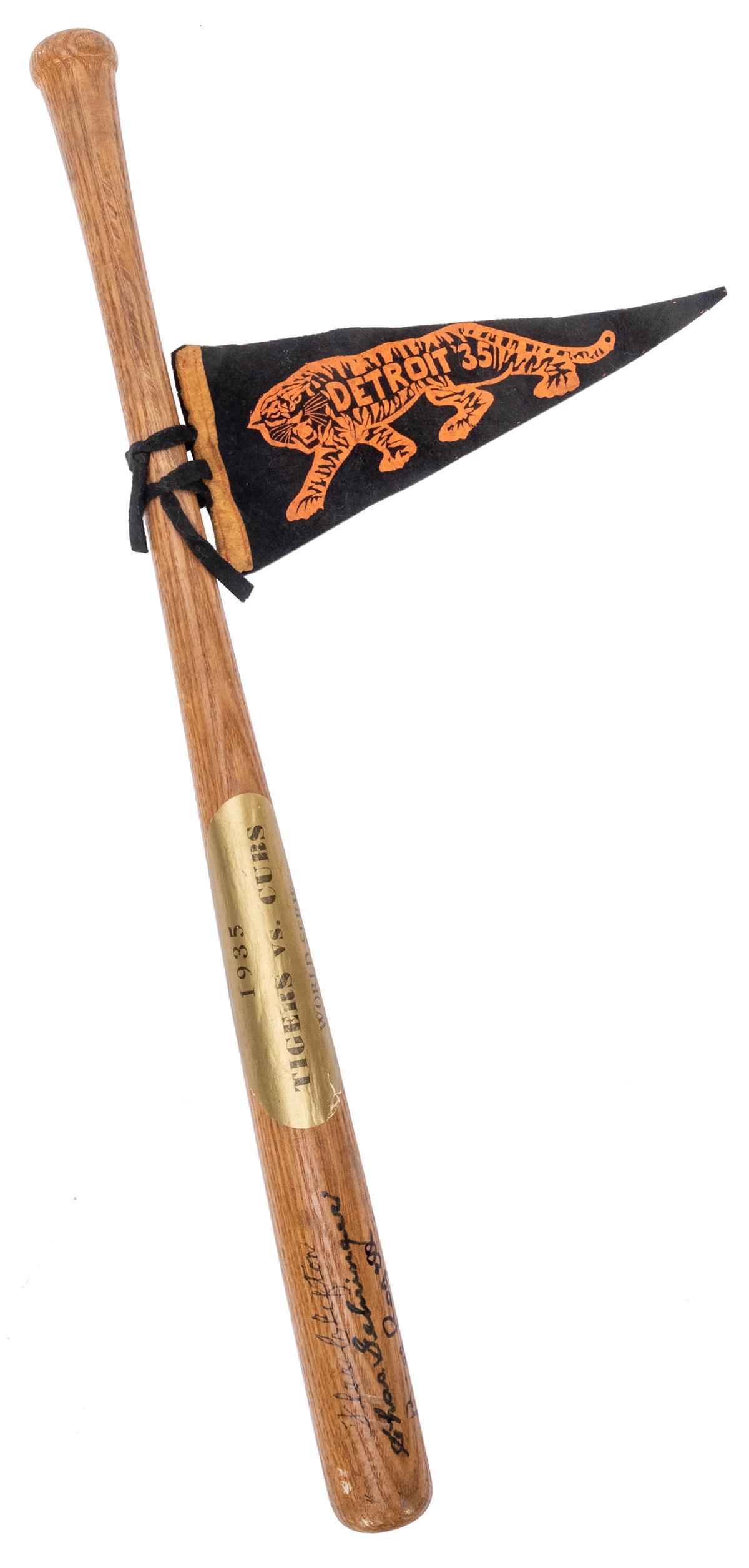 1935 World Series Souvenir Mini Baseball Bat, [signed: 1935 World Series Souvenir Mini Baseball Bat, [signed by Detroit Tigers players]. Signed by Bill Rogell, Flea Clifton, Charlie Gehringer (HOF), Elden Auker, and Ray Hayworth. A gilt printed sticker af