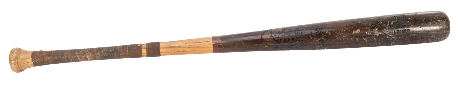 Fred McGriff Game Used Baseball Bat. Louisville Slugger: Fred McGriff Game Used Baseball Bat. Louisville Slugger S216, stamped “McGriff”. Length 33”. Handle wrapped with tape for grip, several hit marks.