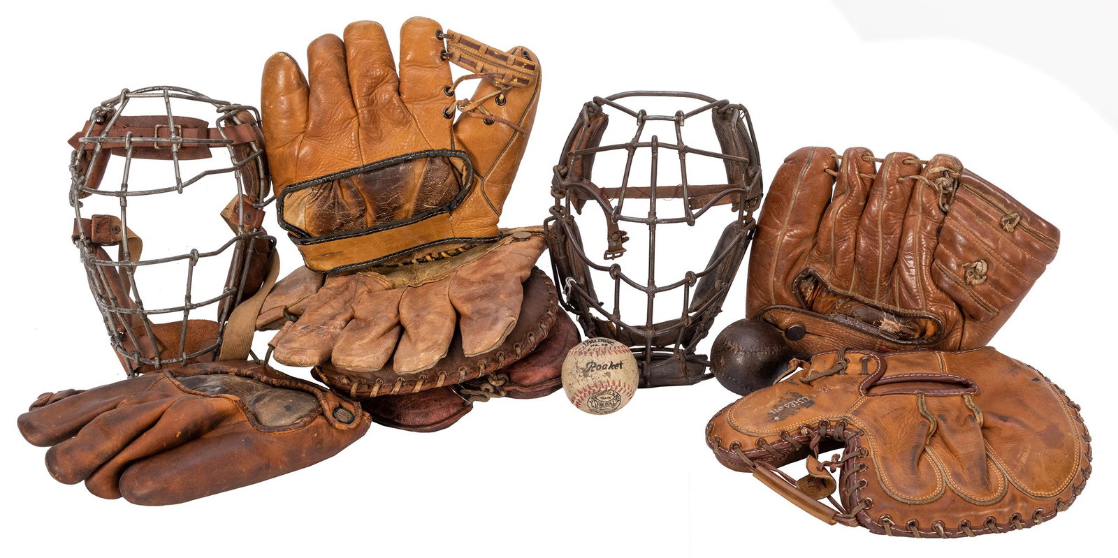 Group of 11 Early Baseball Gloves, Masks, and Balls.: Group of 11 Early Baseball Gloves, Masks, and Balls. 1900s/1950s. Includes three catcher’s gloves (Spalding, Reach, and a Wilson Rube Walker); four infielder gloves; two balls; and two metal wir