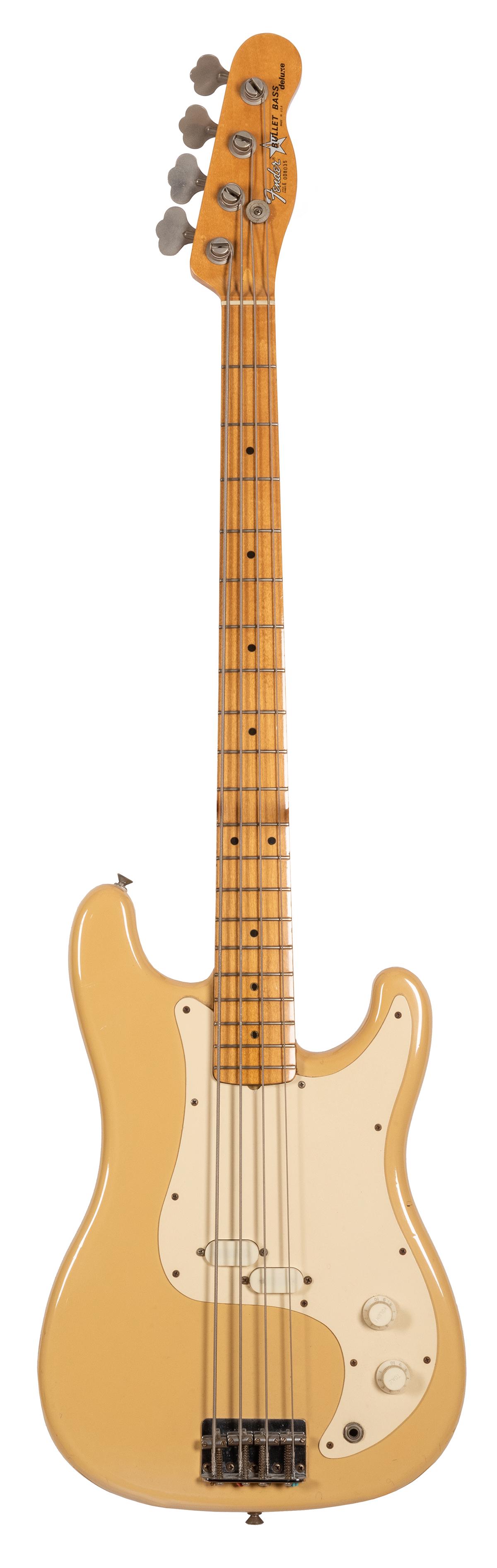 Fender Bullet Deluxe Electric Bass Guitar. U.S.A., ca.: Fender Bullet Deluxe Electric Bass Guitar. U.S.A., ca. 1980s. Never reissued after two-year production. Mustang style pickups, split oval, tele style headstock, maple neck, alder body, all original. I
